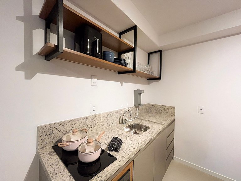 Estúdio com piscina no coração da cidade