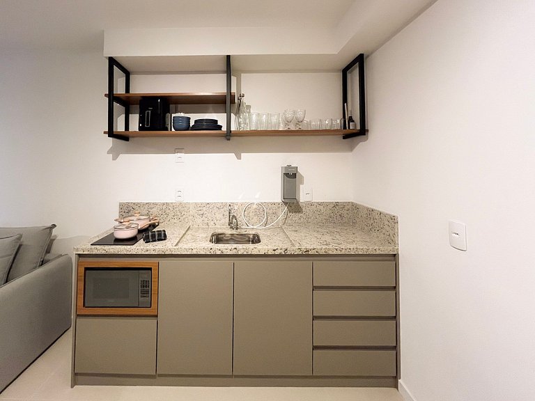 Estúdio com piscina no coração da cidade