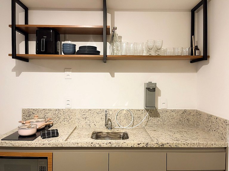 Estúdio com piscina no coração da cidade