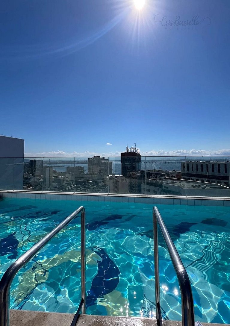 Estudio amplo com piscina aquecida e vista